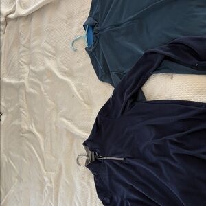 Lot of two blue men’s golf quarter zip. Size medium. Cold gear, climb a warm.